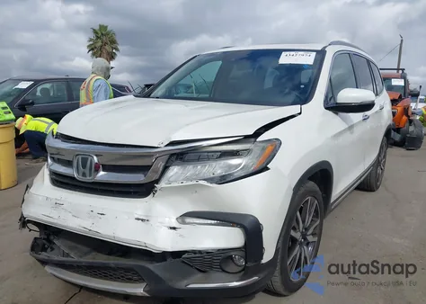 2019 Honda Pilot Touring from USA, damaged, VIN 5FNYF5H65KB019669